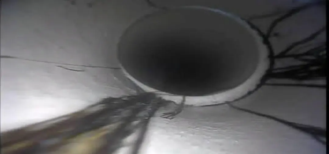 Drain camera view inside a pipe during a survey