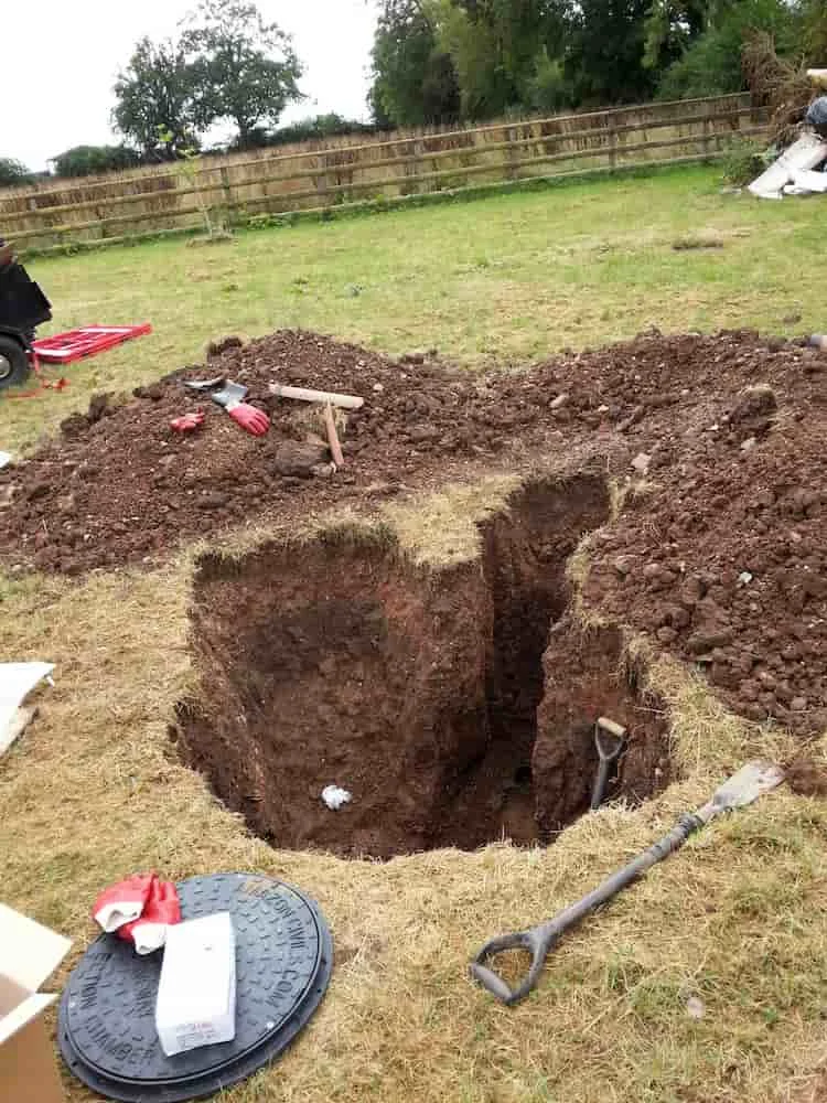 Lawn dug up to reach a broken drain underneath